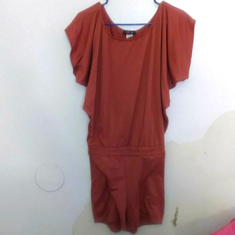 A jumpsuit woth shorts and over the shoulshoulder